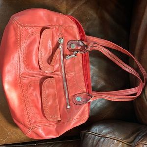Selling Fossil shoulder bag. Color is coral